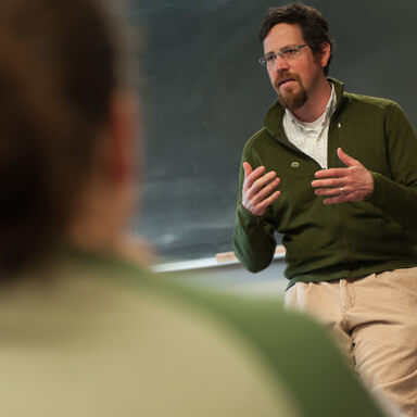 A professor gives a lecture.